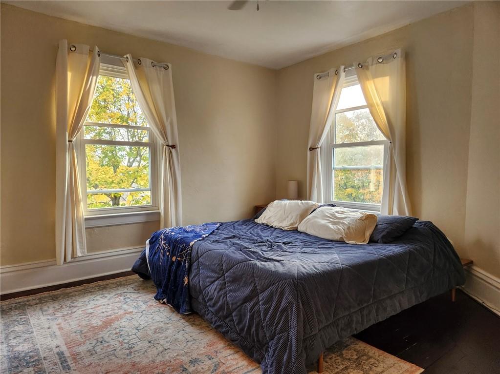 614 3rd Street Butler, PA 16001 - Photo 23 of 43 a bedroom with a bed and a window