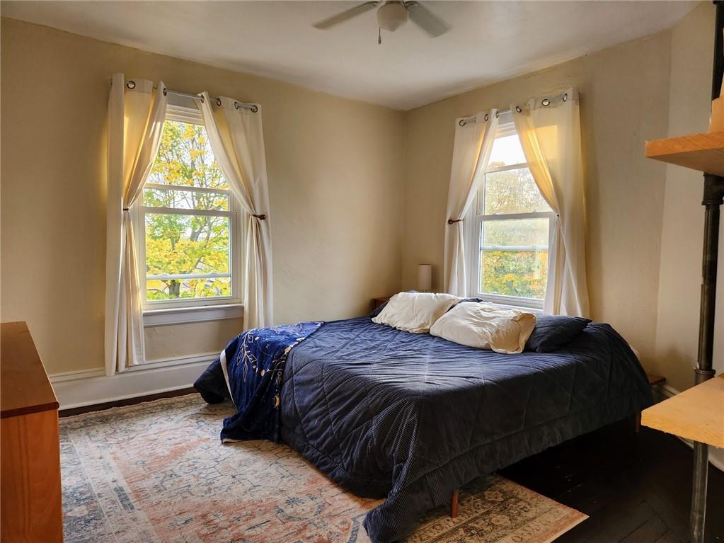 614 3rd Street Butler, PA 16001 - Photo 25 of 43 a bed sitting in a bedroom next to a window