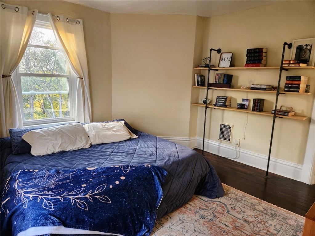 614 3rd Street Butler, PA 16001 - Photo 26 of 43 a bedroom with a bed and a window