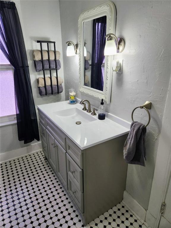 614 3rd Street Butler, PA 16001 - Photo 27 of 43 a bathroom with a sink and a mirror