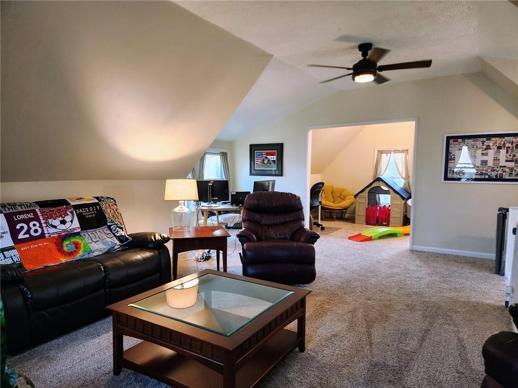 614 3rd Street Butler, PA 16001 - Photo 38 of 43 a living room with furniture and a rug