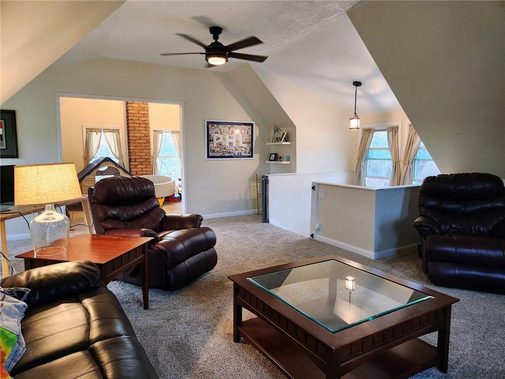614 3rd Street Butler, PA 16001 - Photo 39 of 43 a living room with furniture and a wooden floor