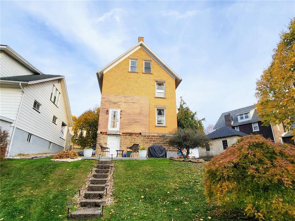 614 3rd Street Butler, PA 16001 - Photo 42 of 43 a front view of a house with a yard