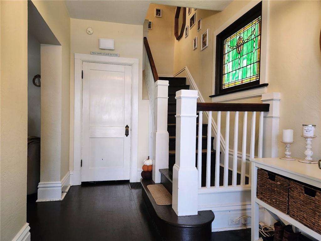 614 3rd Street Butler, PA 16001 - Photo 5 of 43 a view of entryway and hall with wooden floor