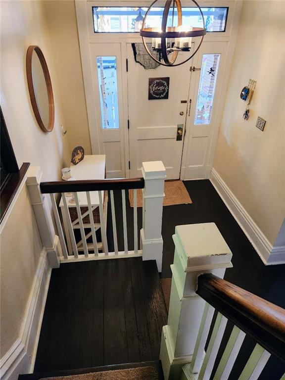 614 3rd Street Butler, PA 16001 - Photo 6 of 43 a view of entryway and hall with wooden floor