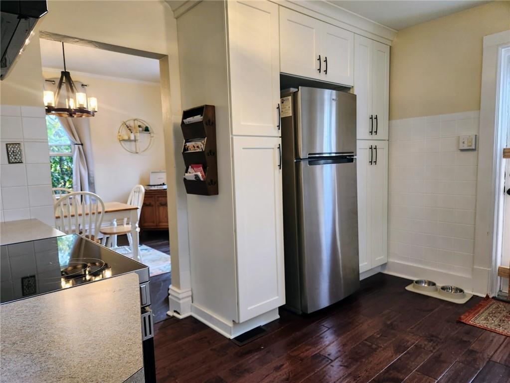 614 3rd Street Butler, PA 16001 - Photo 7 of 43 a kitchen with stainless steel appliances granite countertop a refrigerator and a stove top oven
