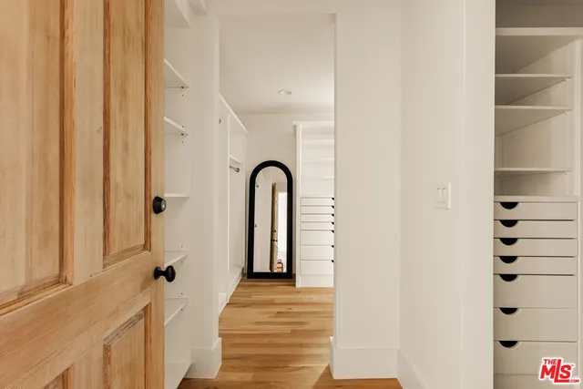 a view of a hallway with front door