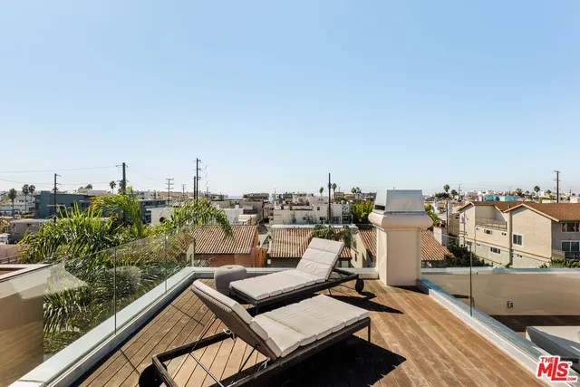 a view of a terrace with seating area