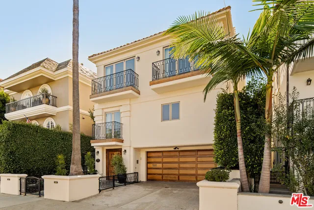 a view of a house with a street