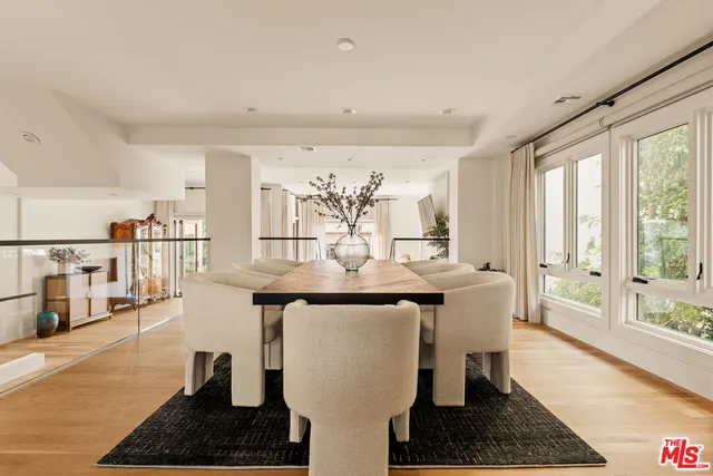 a view of a kitchen and dining room