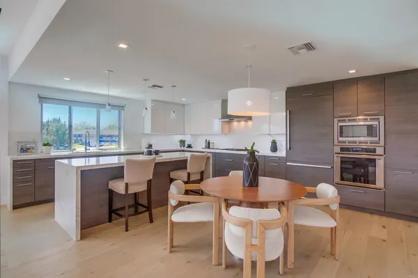 a view of a dining room with furniture