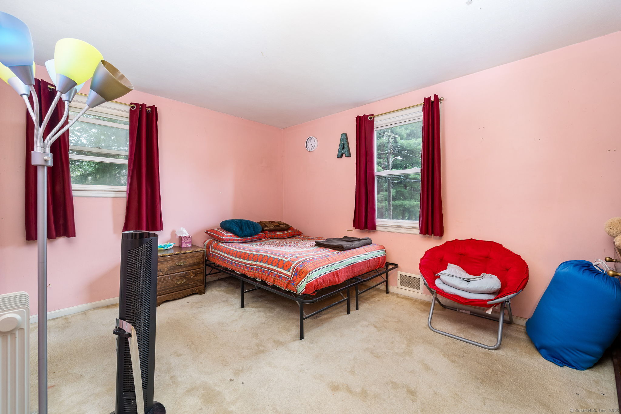 173 Timber Trail Wethersfield, CT 06109 - Photo 14 of 18 a bedroom with a bed and a window