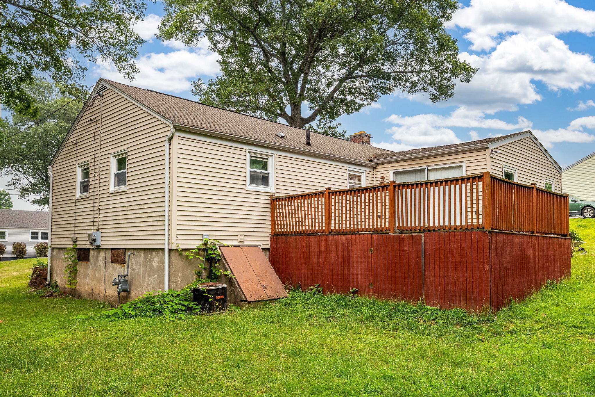 173 Timber Trail Wethersfield, CT 06109 - Photo 3 of 18 a view of backyard with deck