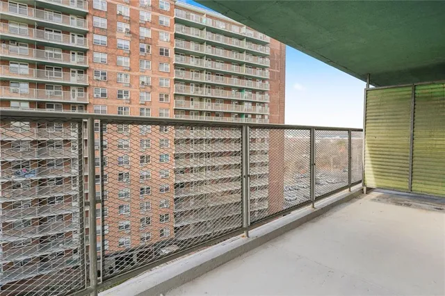 a view of a balcony with a staircase
