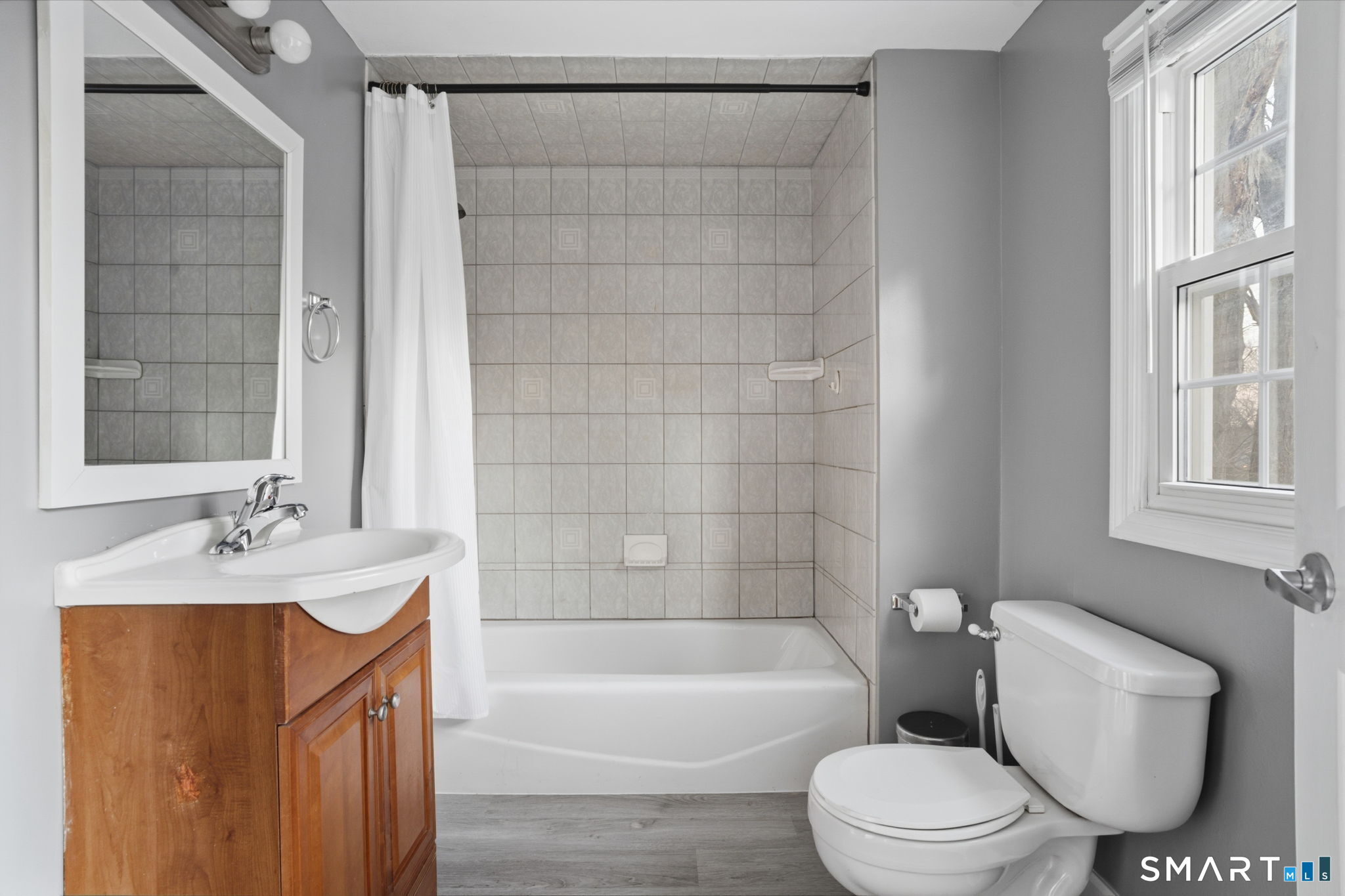 475 Mix Street Bristol, CT 06010 - Photo 6 of 36 a bathroom with a sink toilet and shower