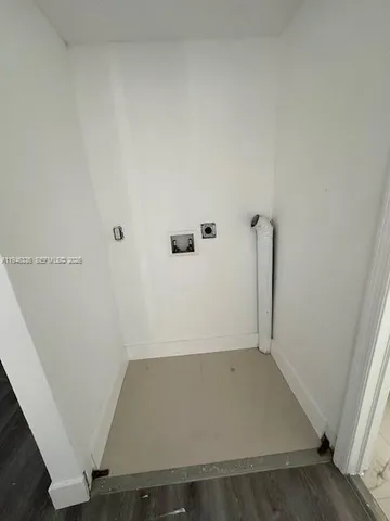 an empty room with a door