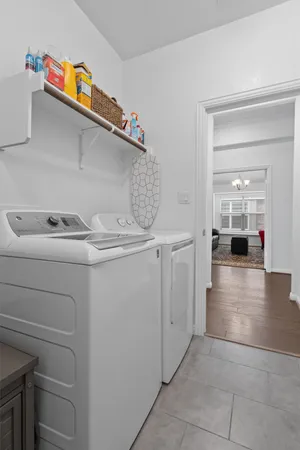 a utility room with washer and dryer