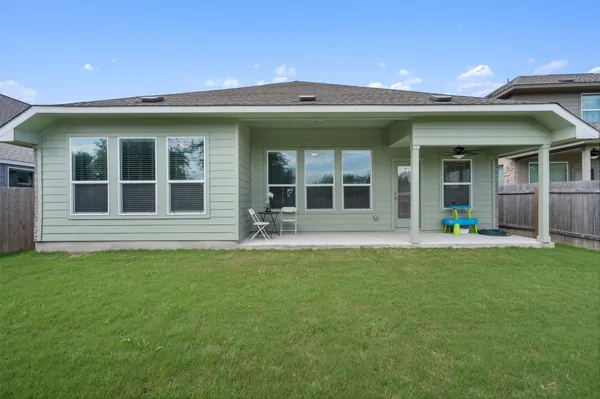 a view of a house with a garden