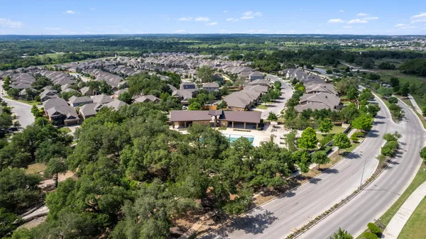 an aerial view of a city with lots of residential buildings