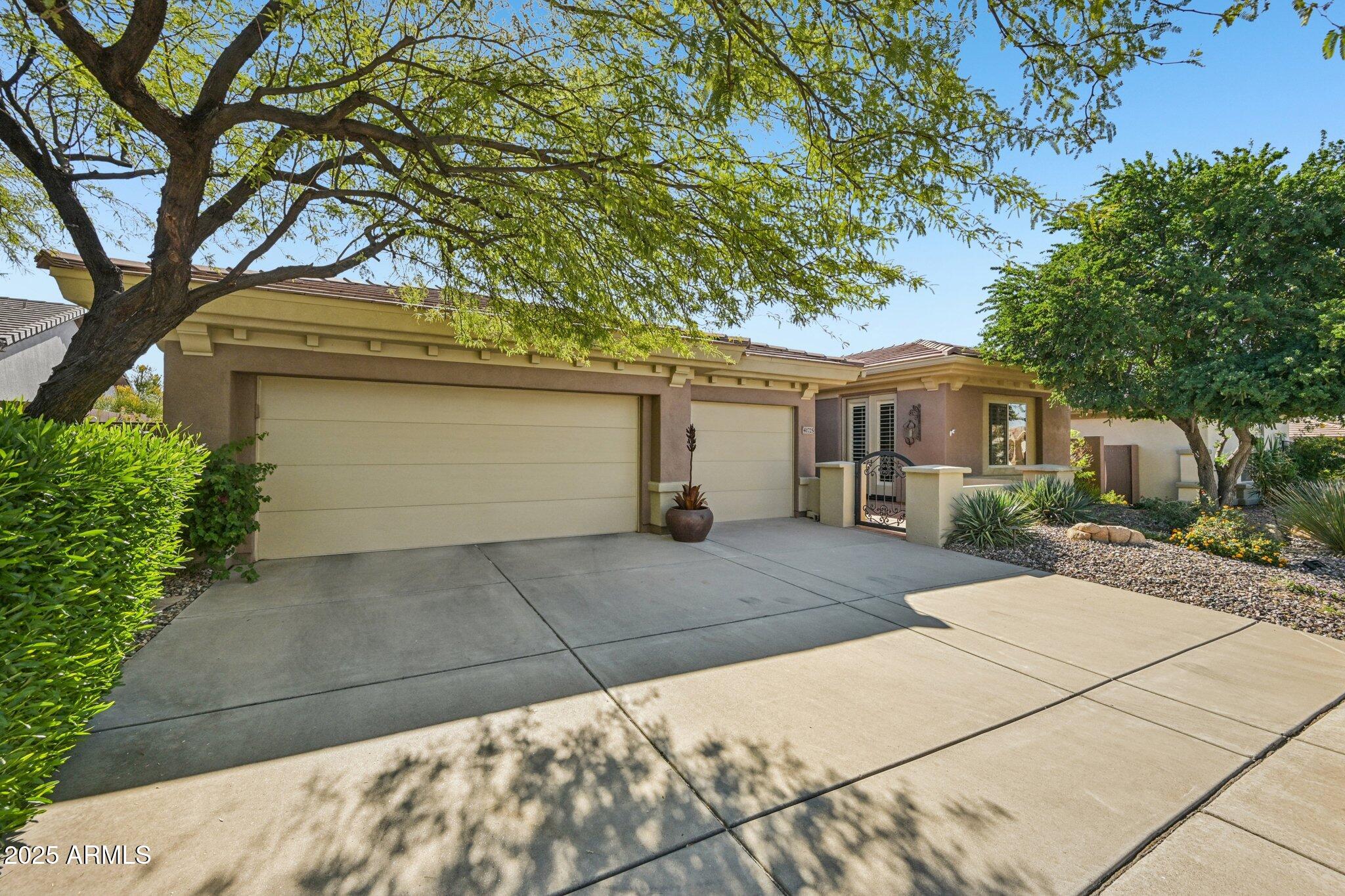 41725 North Golf Crest Road Anthem, AZ 85086 - Photo 47 of 60 front view of a house with a yard