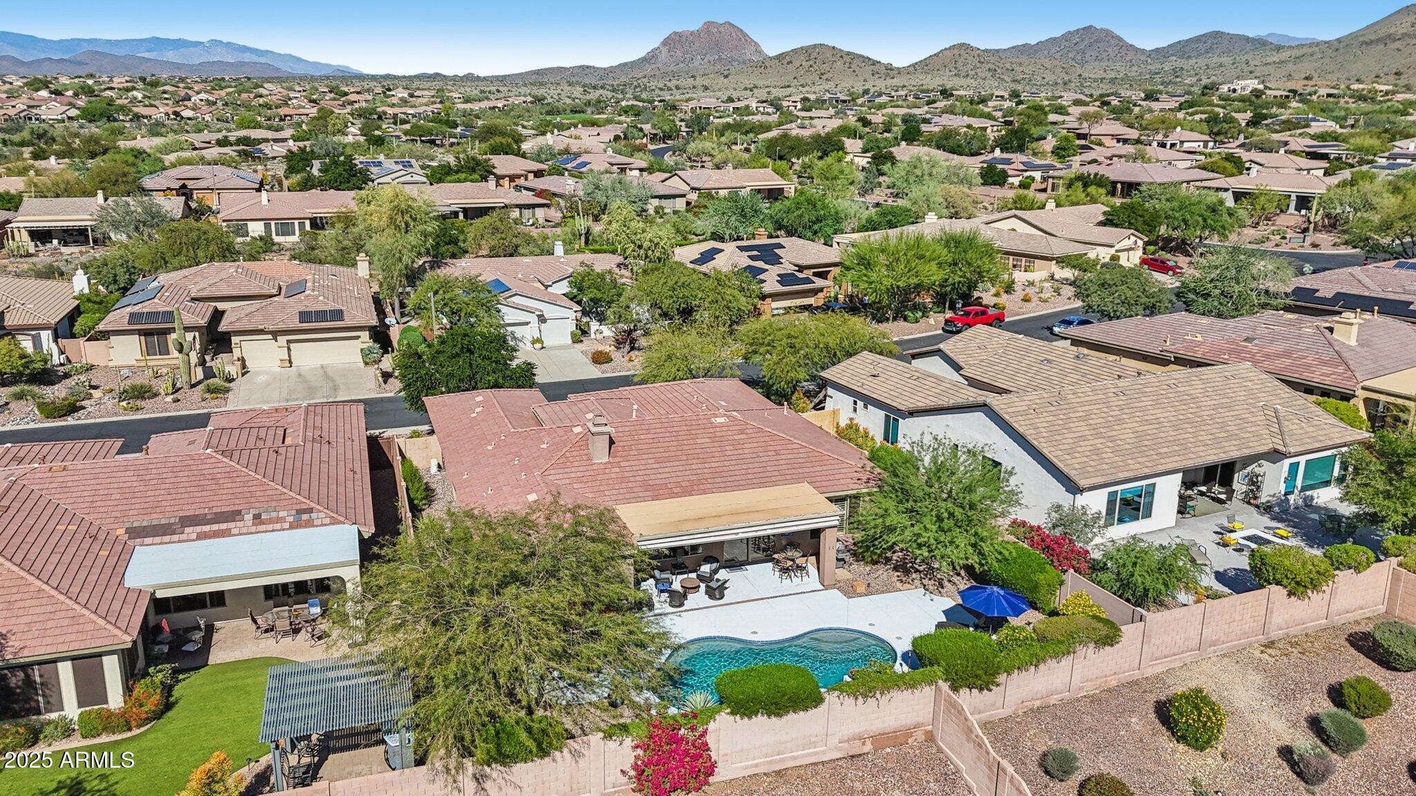 41725 North Golf Crest Road Anthem, AZ 85086 - Photo 51 of 60 an aerial view of residential houses with outdoor space
