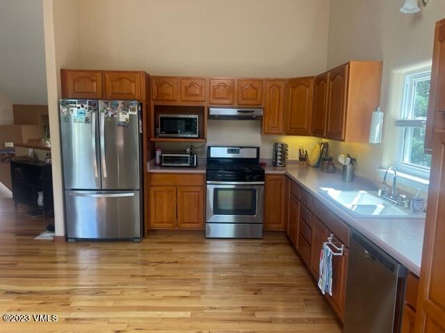 6 Ringneck Eagle, CO 81631 - Photo 17 of 50 a kitchen with stainless steel appliances a refrigerator a stove a sink a washer dryer and cabinets