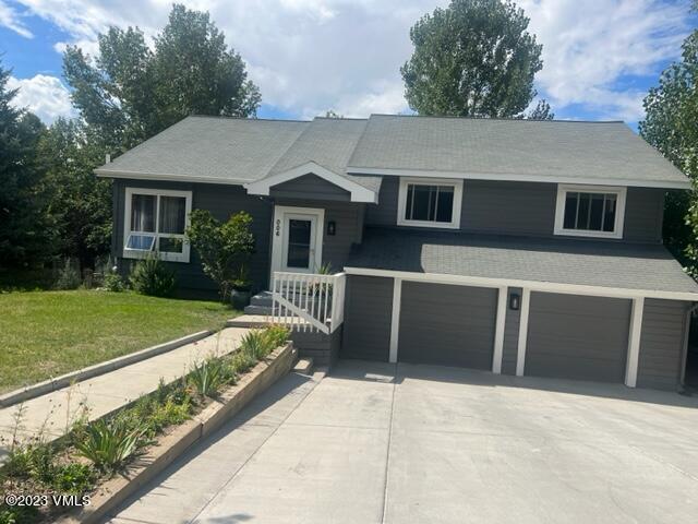 6 Ringneck Eagle, CO 81631 - Photo 2 of 50 a front view of a house with a yard and garage