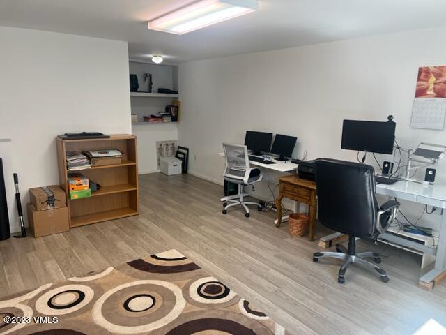 6 Ringneck Eagle, CO 81631 - Photo 41 of 50 a view of workspace with a computer on desk and wooden floor