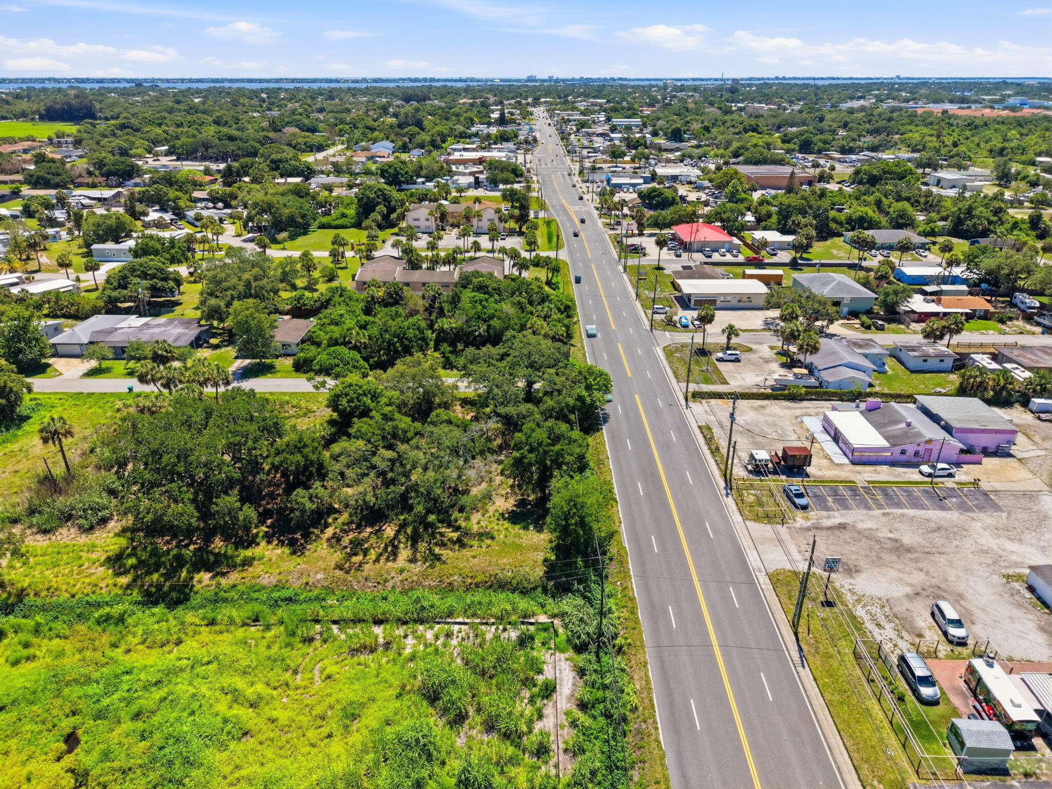 0 Aurora Road Melbourne, FL 32935 - Photo 10 of 20 an aerial view of residential houses with outdoor space