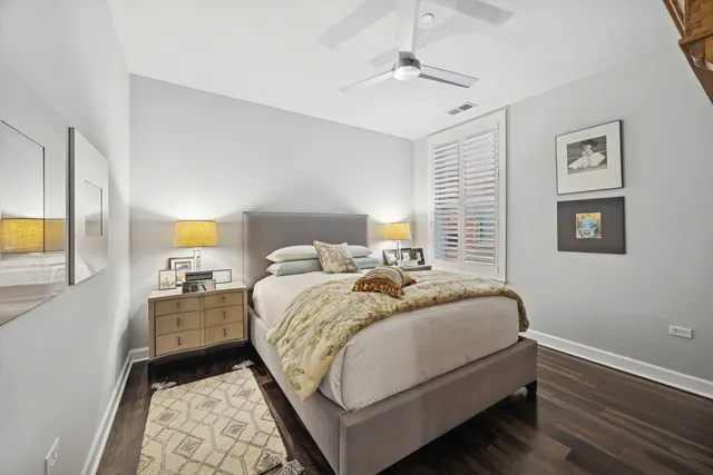 a bedroom with a bed and dresser