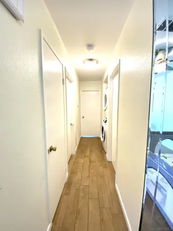 a view of a bathroom from the hallway