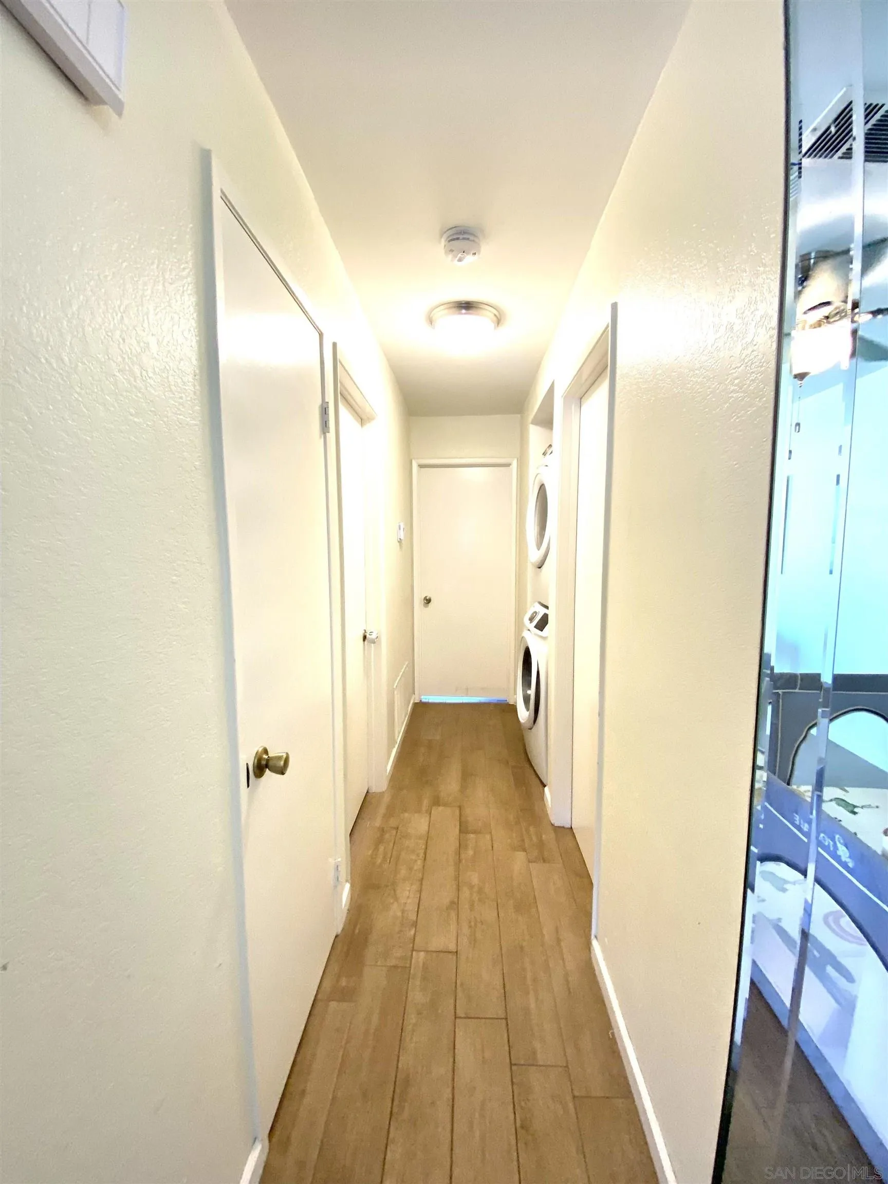 8834 Tamberly Lane, Unit D Santee, CA 92071 - Photo 11 of 28 a view of a bathroom from the hallway
