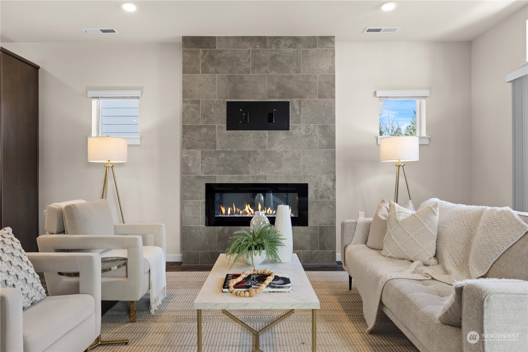 20803 3rd Drive Southeast Bothell, WA 98012 - Photo 11 of 30 a living room with furniture and a fireplace