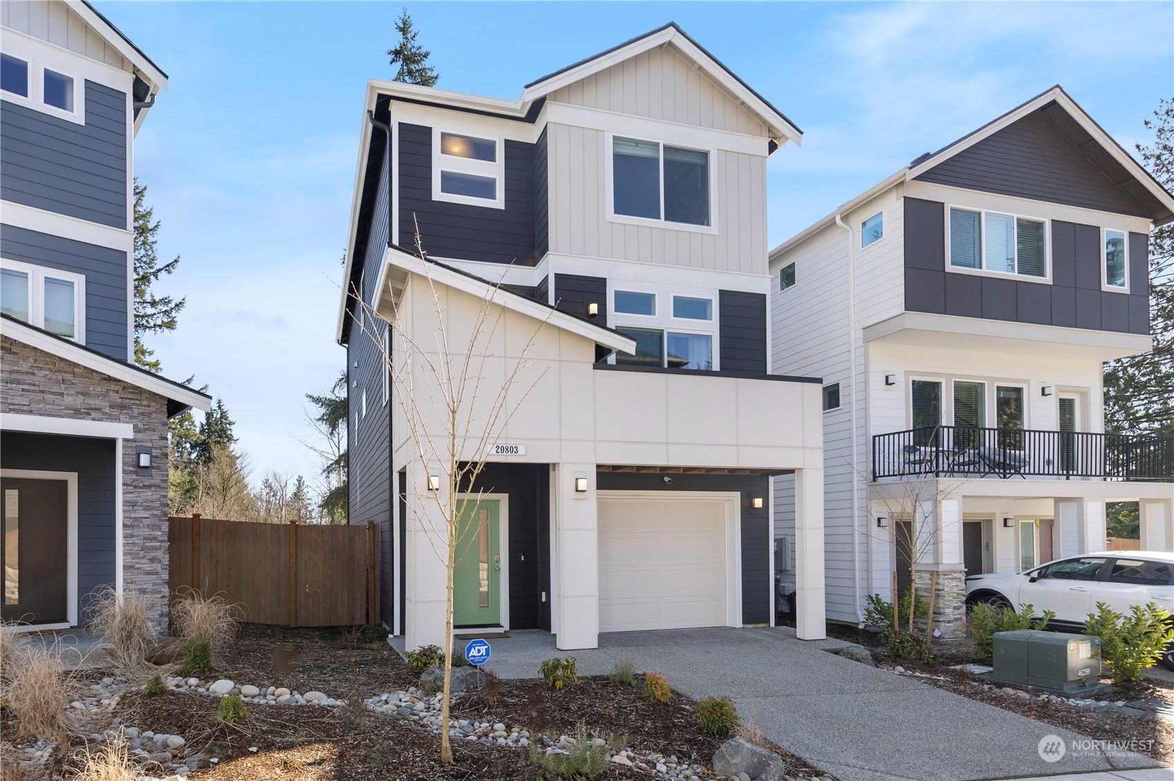 20803 3rd Drive Southeast Bothell, WA 98012 - Photo 2 of 30 a front view of a house with a yard