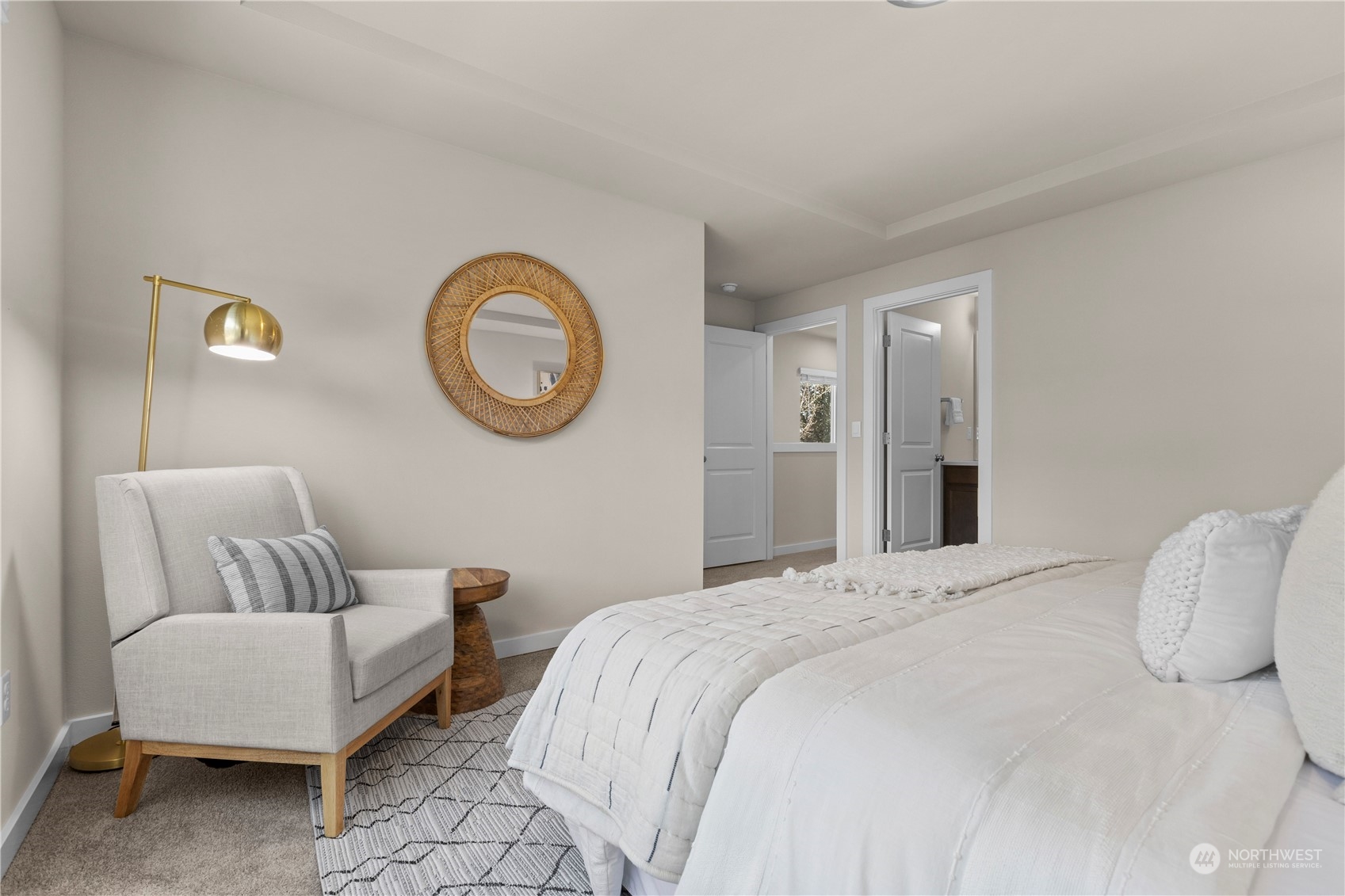 20803 3rd Drive Southeast Bothell, WA 98012 - Photo 22 of 30 a bedroom with a bed and a chair