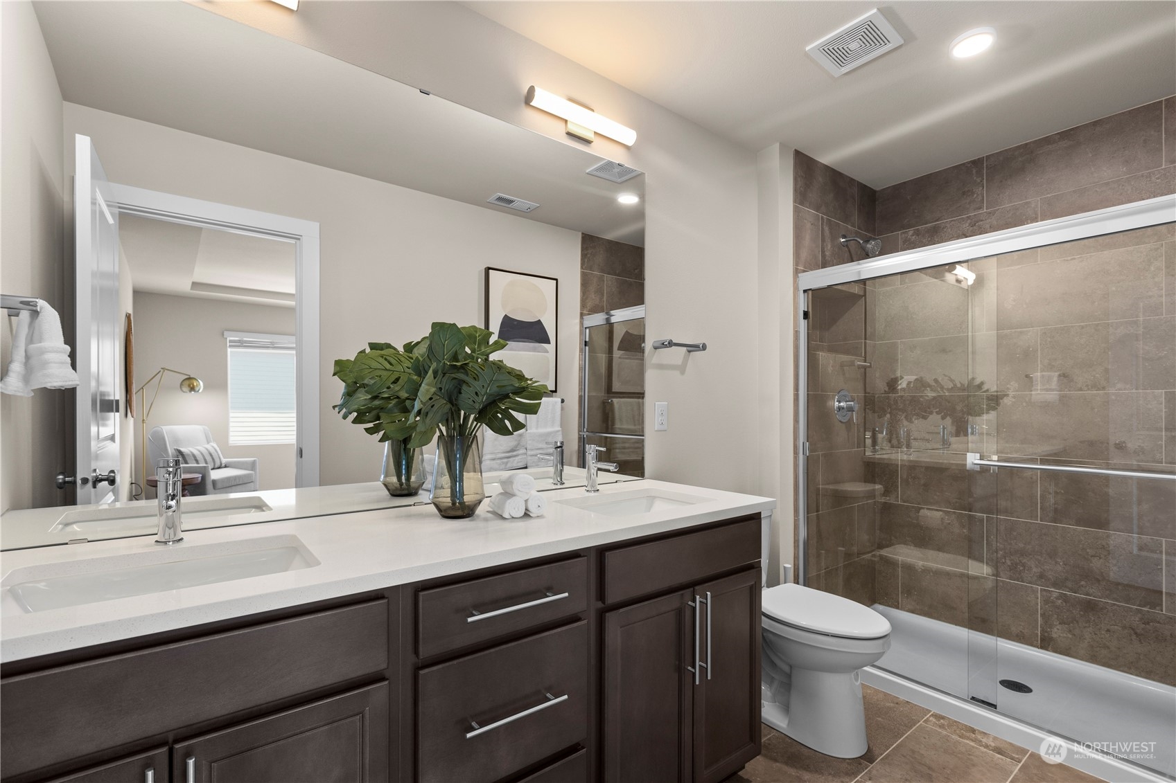 20803 3rd Drive Southeast Bothell, WA 98012 - Photo 23 of 30 a bathroom with a double vanity sink toilet and shower