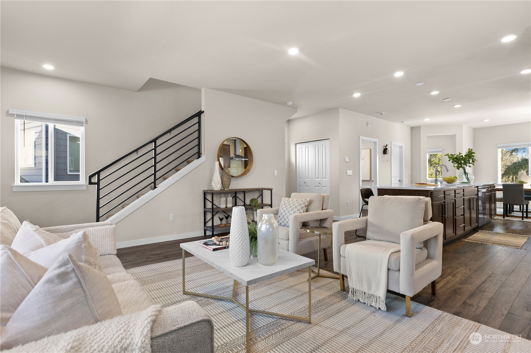 20803 3rd Drive Southeast Bothell, WA 98012 - Photo 7 of 30 a living room with furniture a wooden floor and a chandelier