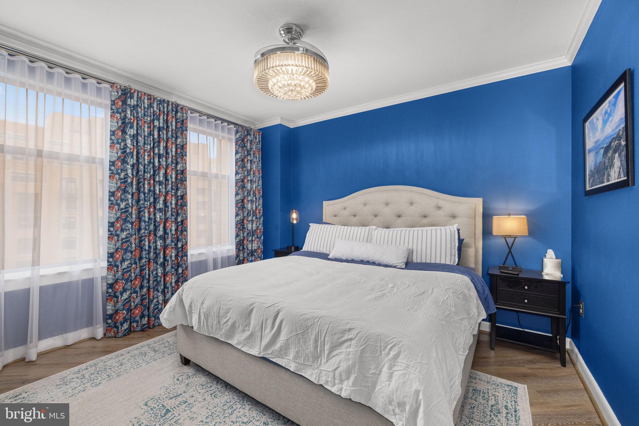 400 Massachusetts Avenue Northwest, Unit 1011 Washington, DC 20001 - Photo 13 of 31 a bedroom with a bed and a window