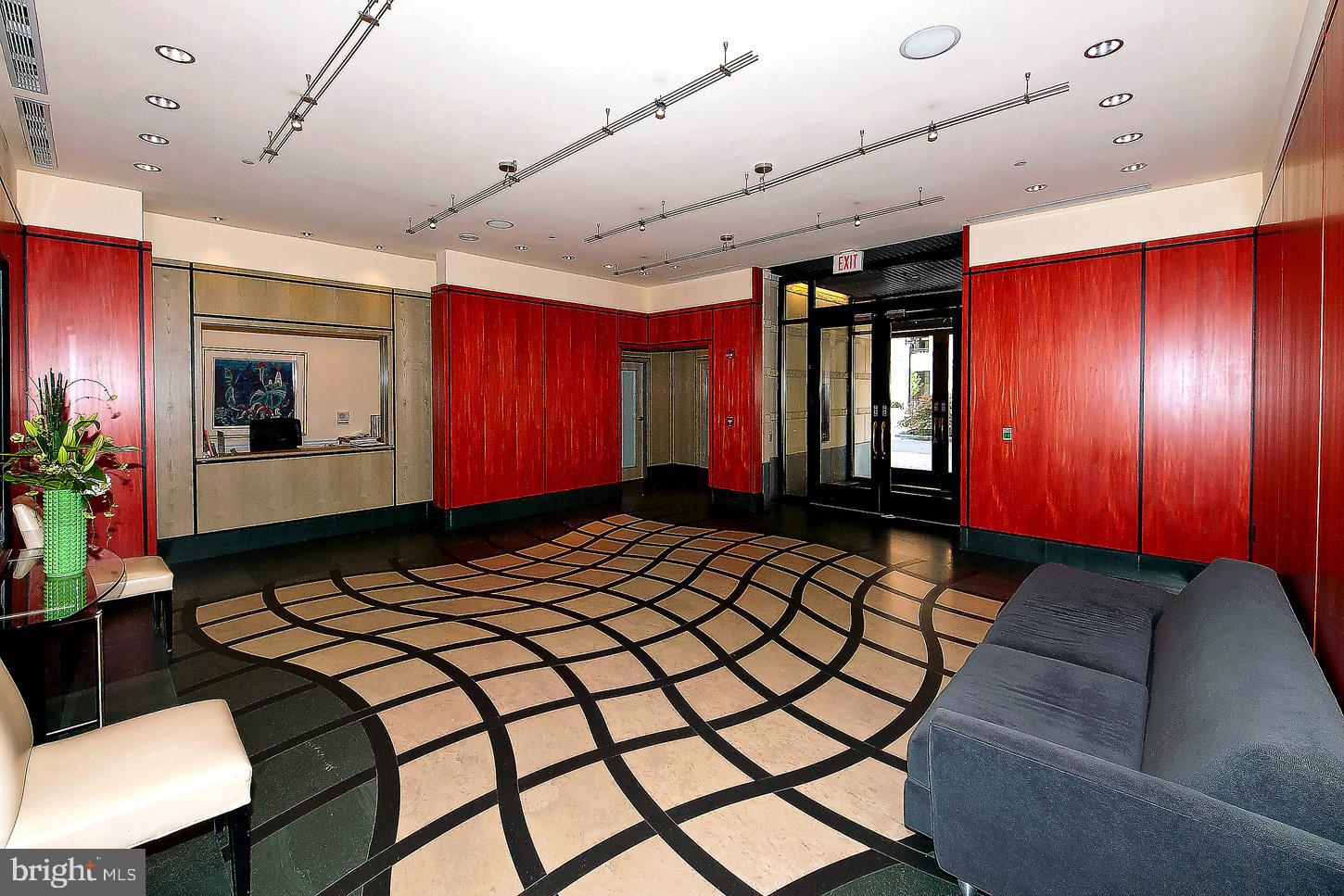 400 Massachusetts Avenue Northwest, Unit 1011 Washington, DC 20001 - Photo 21 of 31 a front view of a house with entryway