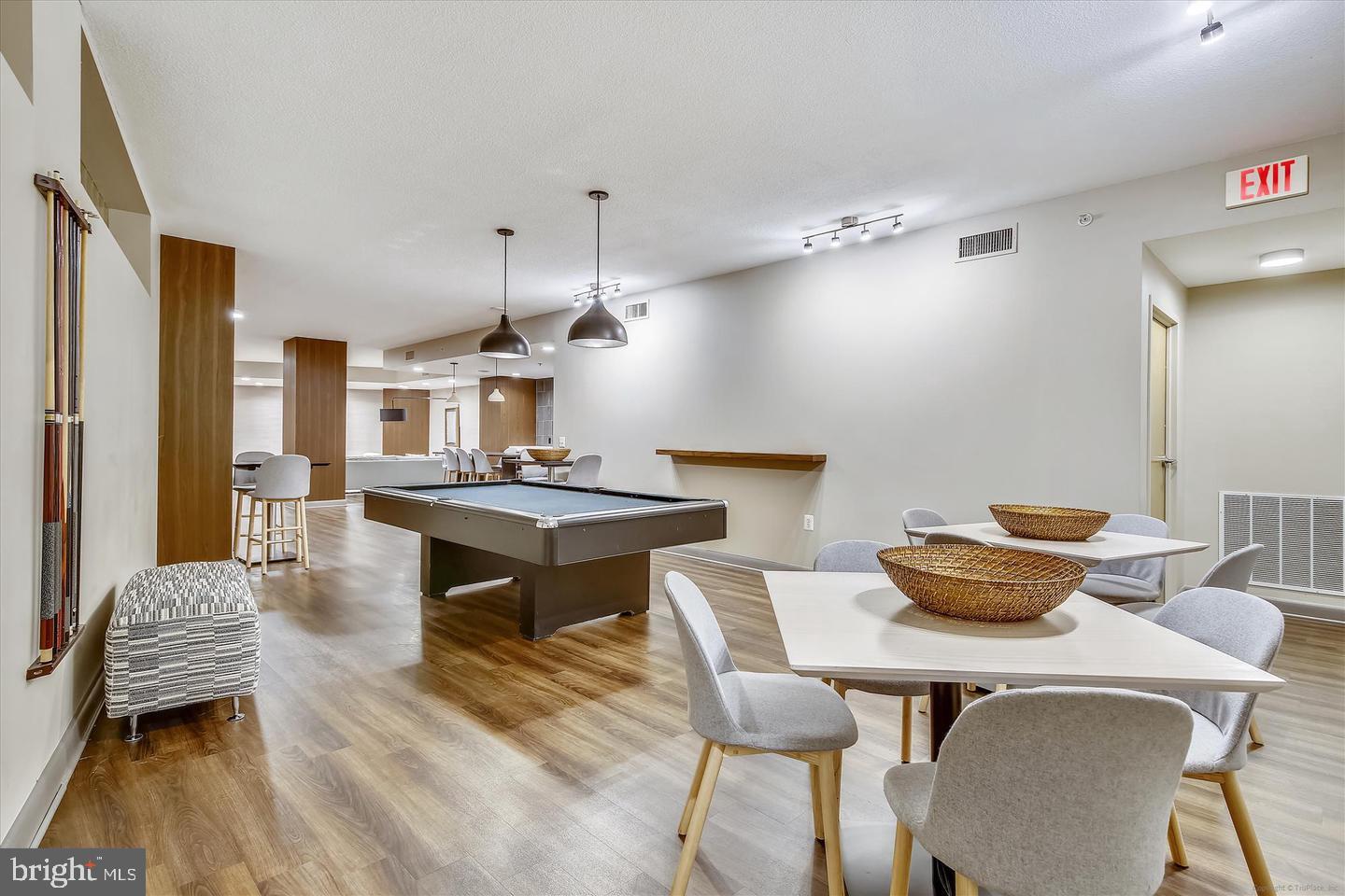 400 Massachusetts Avenue Northwest, Unit 1011 Washington, DC 20001 - Photo 22 of 31 a living room with furniture and a table