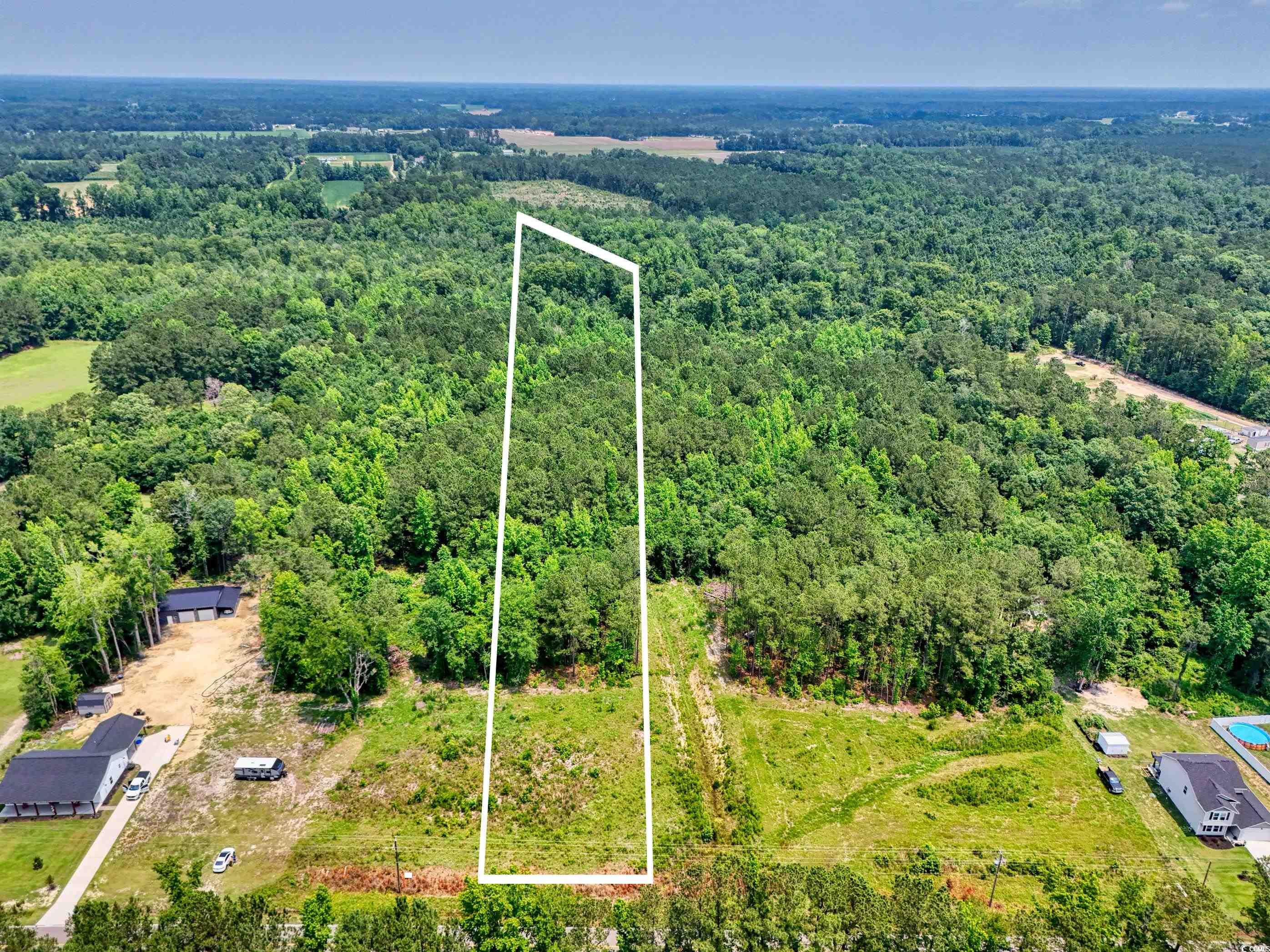 Tbd Valley Forge Road Aynor, SC 29511 - Photo 3 of 9 View of property location with a heavily wooded area and property boundaries highlighted