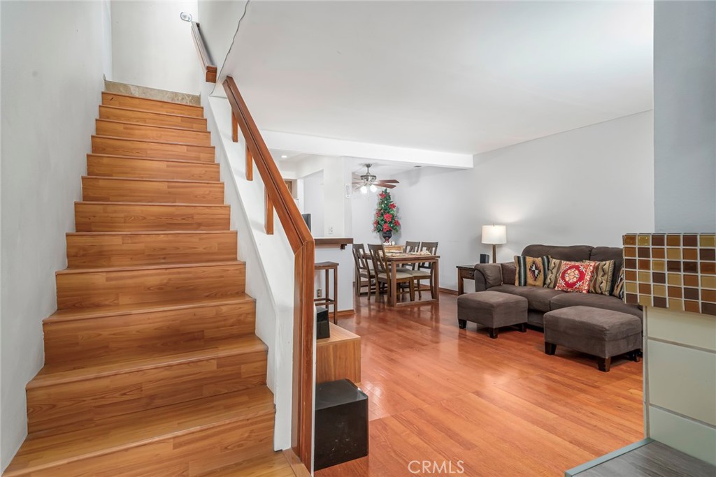 25712 Le Parc, Unit 48 Lake Forest, CA 92630 - Photo 13 of 30 a living room with furniture and stairs