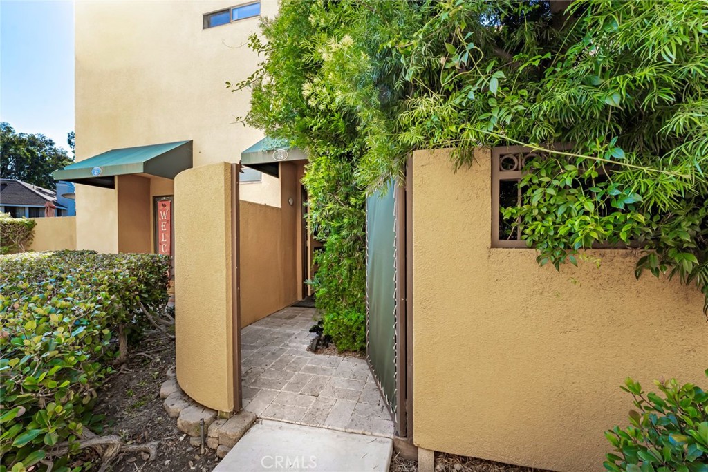 25712 Le Parc, Unit 48 Lake Forest, CA 92630 - Photo 22 of 30 front view of a house with a yard
