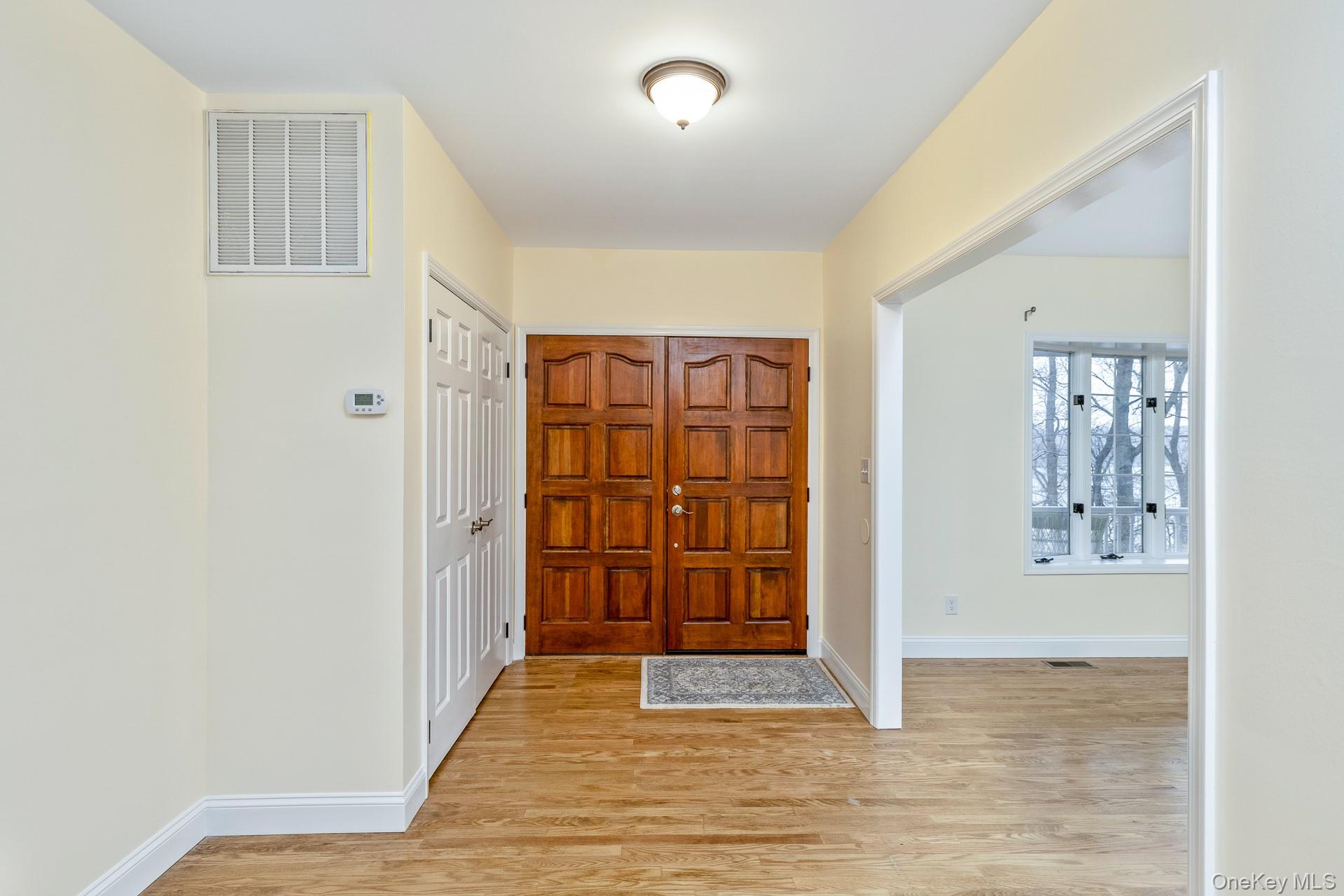 451 River Road St. James, NY 11780 - Photo 5 of 28 Gracious Front Hall with Guest Closet