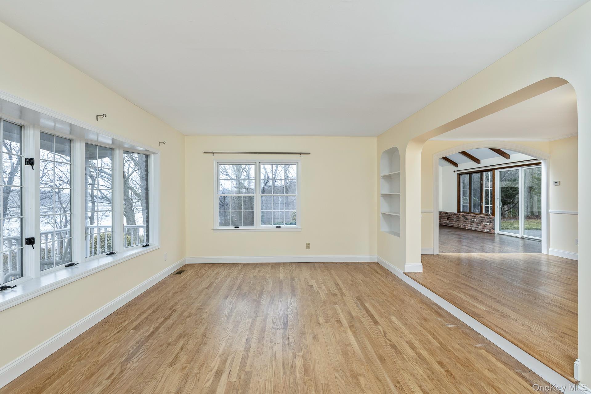 451 River Road St. James, NY 11780 - Photo 7 of 28 Formal Living Room- Built In Shelving, Wood Floors