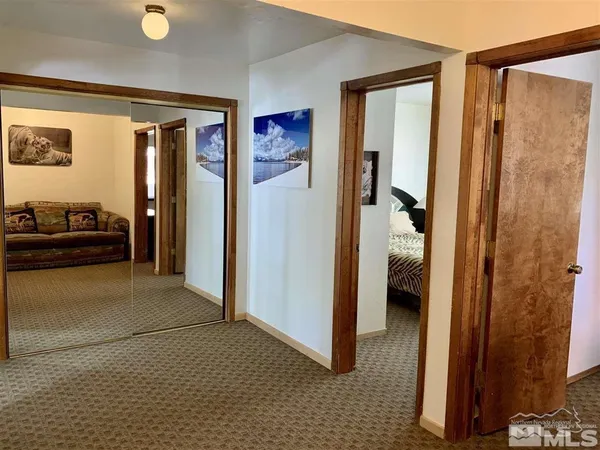 a view of a livingroom with a hallway