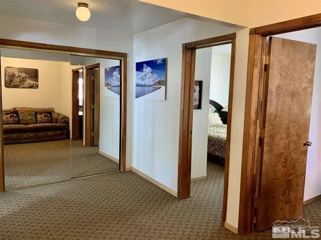 a view of a livingroom with a hallway