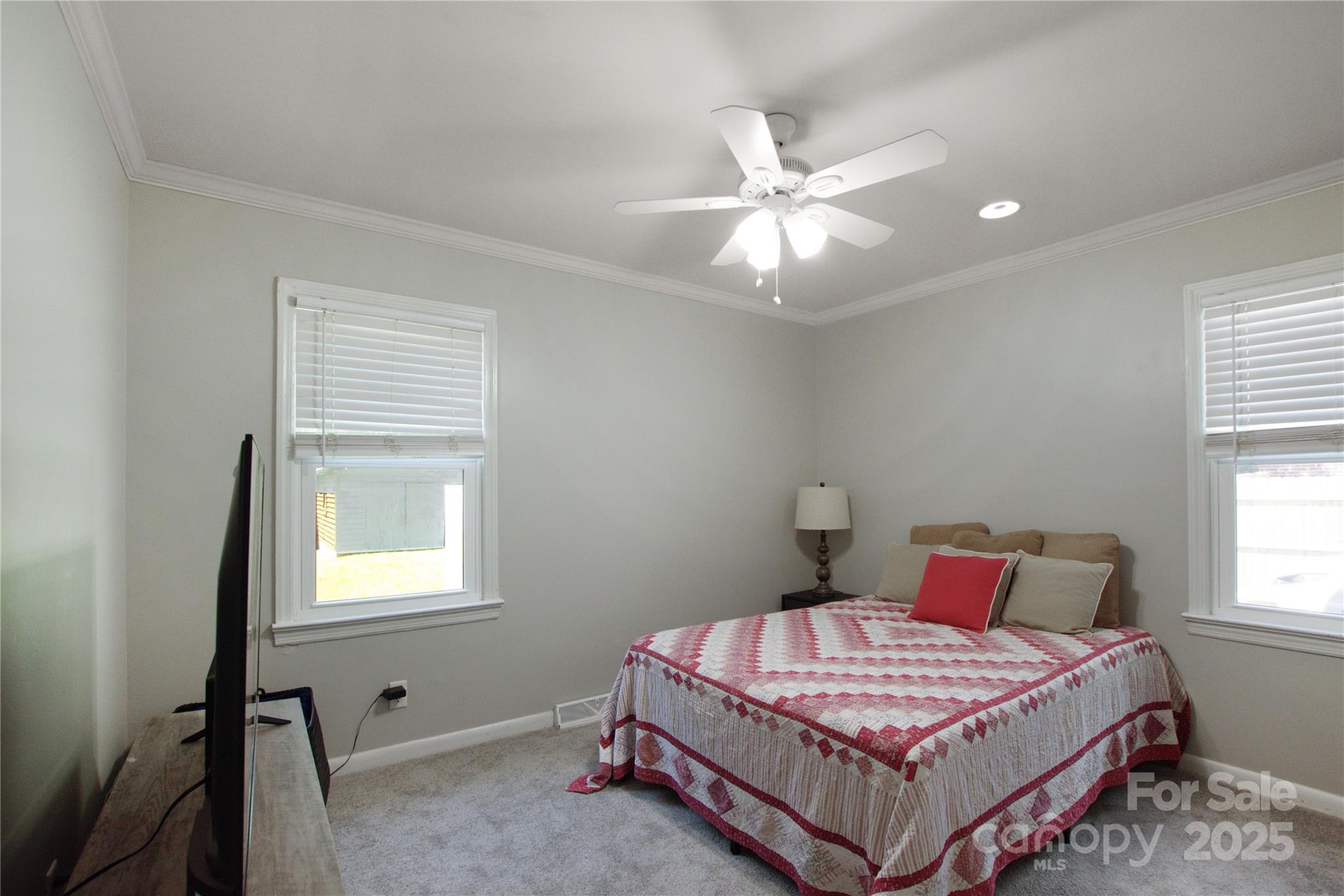 111 Berry Street Chester, SC 29706 - Photo 11 of 23 a bedroom with a bed and a window