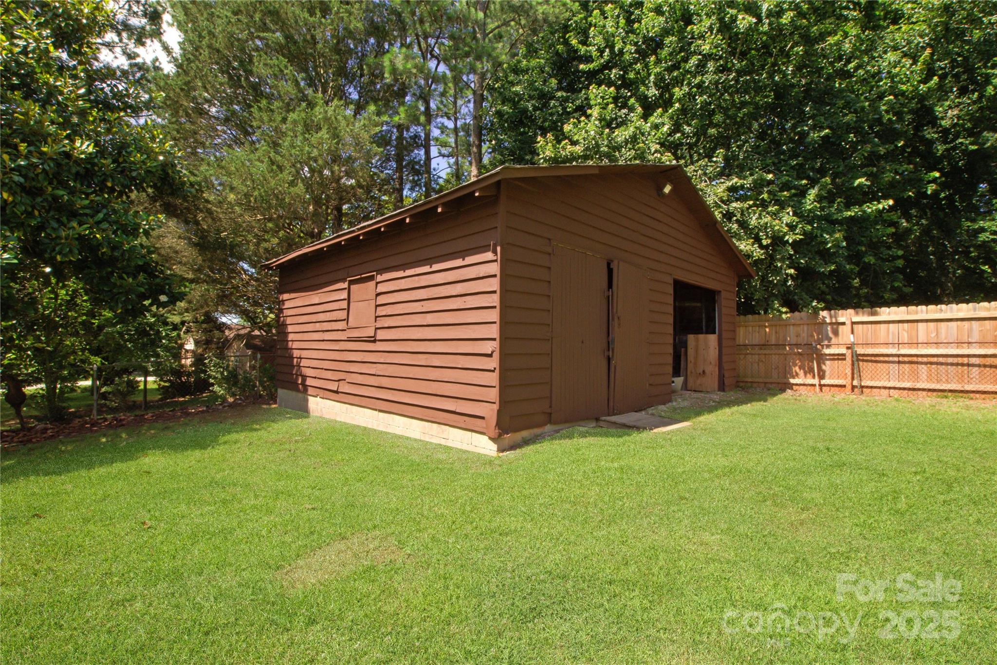 111 Berry Street Chester, SC 29706 - Photo 21 of 23 a backyard of a house with lots of green space