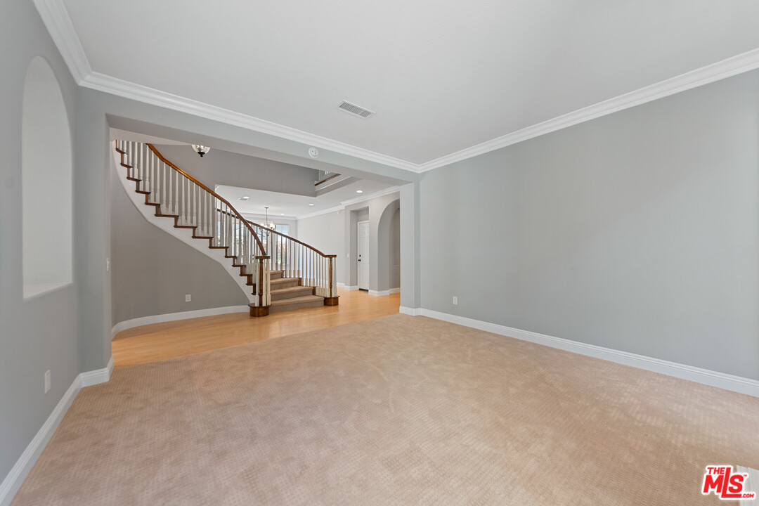 149 Laurel Ridge Drive Simi Valley, CA 93065 - Photo 11 of 53 a view of an empty room with stairs